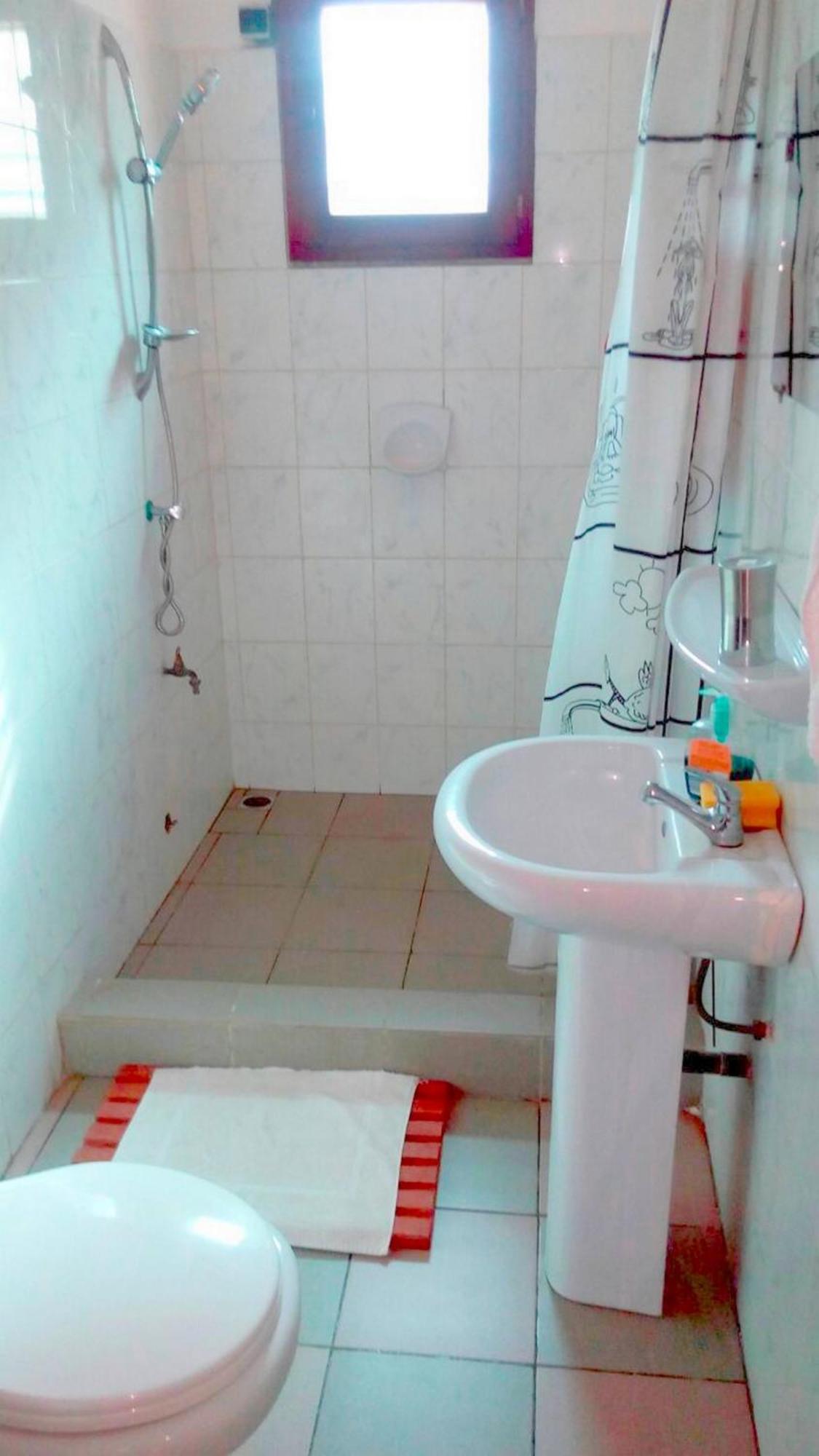 Dodoo Lodge Cotonou Quarto foto